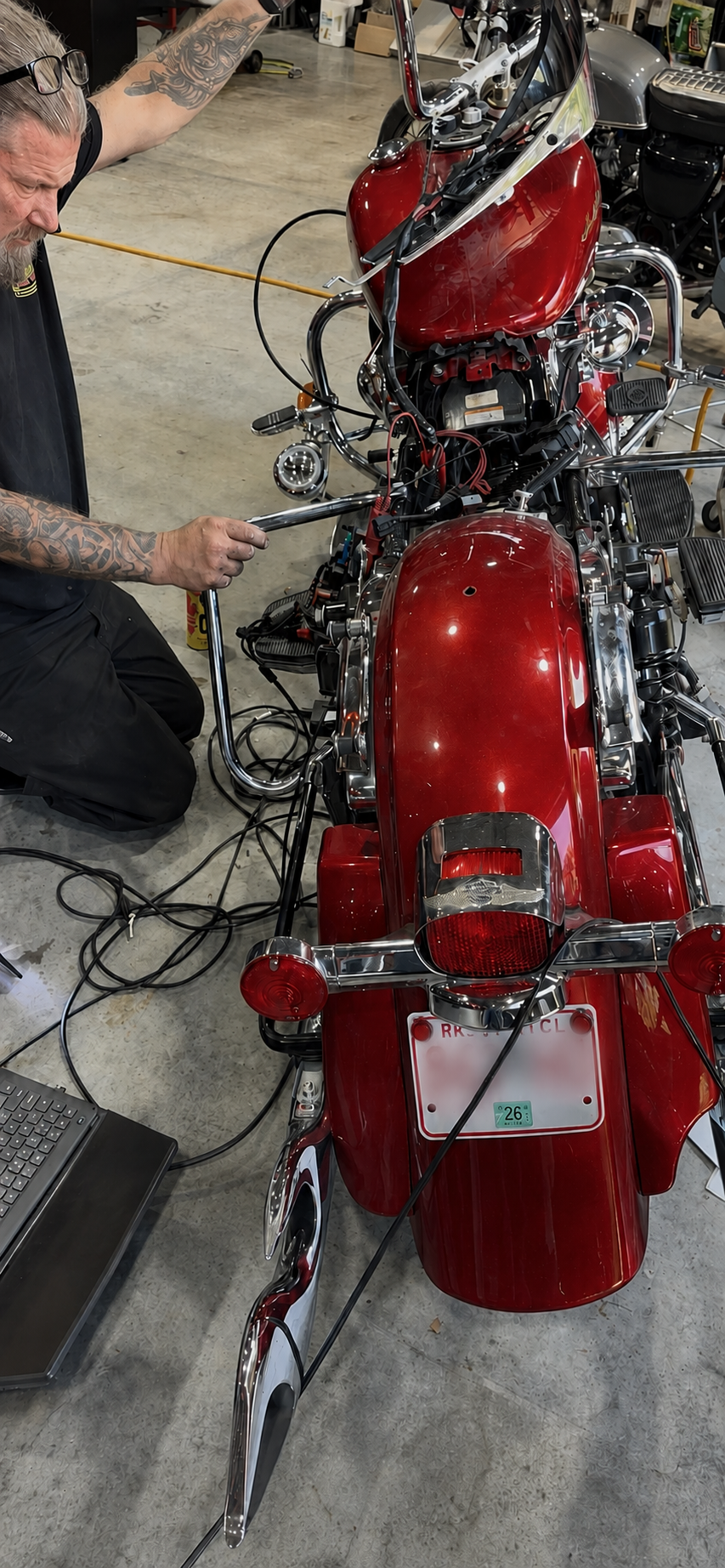 Sean diagnosing a motorcycle at Rodo's Cycle Center